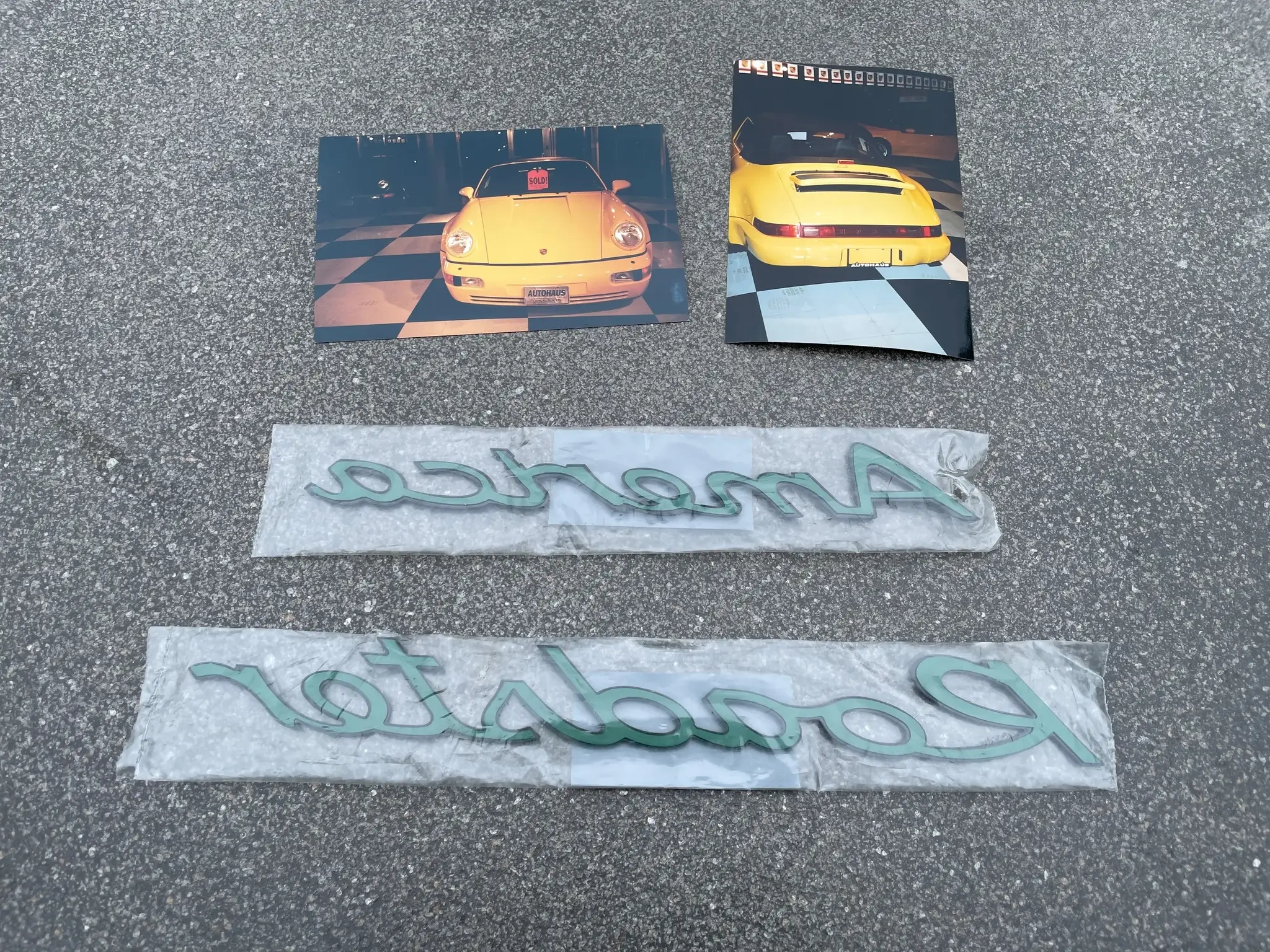 New Old Stock Porsche 964 America Roadster Emblems | PCARMARKET