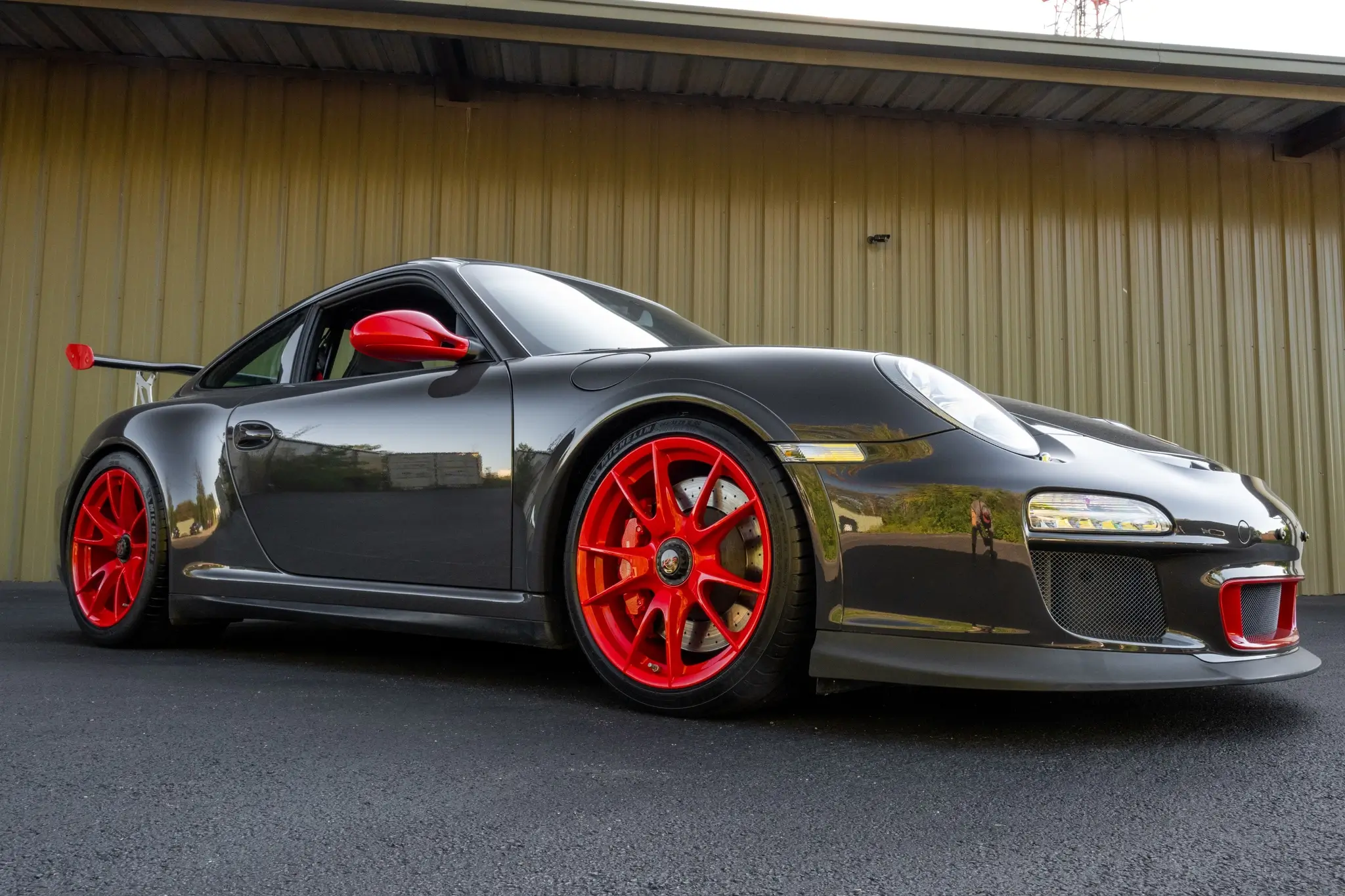 Porsche 911 997-2 GT3 RS Coupé 2010 – Norev 1/43 – Gris Foncé / Rouge – Occasion