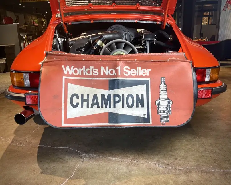 No Reserve Vintage Champion Spark Plugs Fender Cover | PCARMARKET